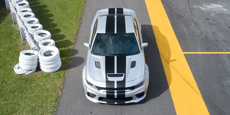 White 2025 Dodge Charger Daytona parked on a road