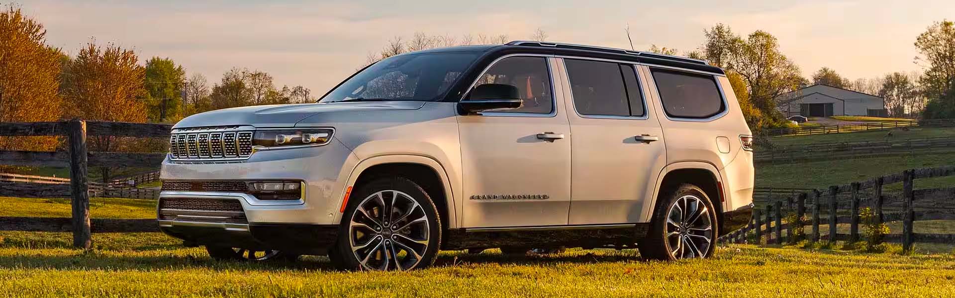 Gray2025 Jeep Grand Wagoneer standing outside home